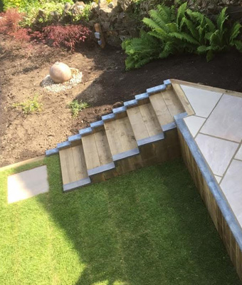King Landscapes Gloucester Stone and Brickwork photo of patio and timber steps