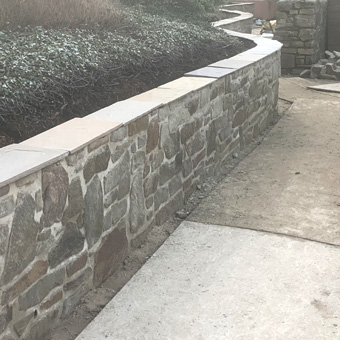 King Landscapes Gloucester Stone and Brickwork photo of stone curved wall