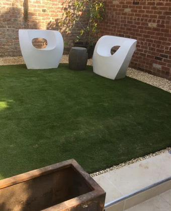 King-Landscapes-Planting-&-Turfing photo of lawn with ornamentals