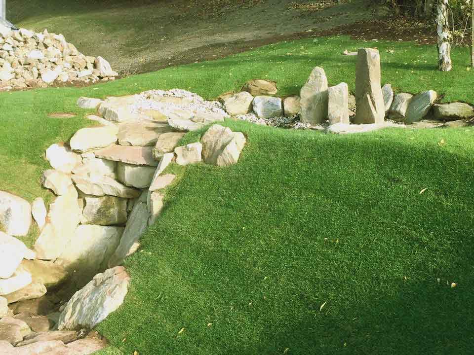 King-Landscapes-Planting-&-Turfing photo of lawn with rocks