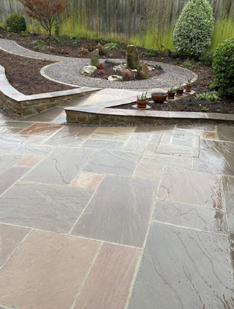 King Landscapes photo of patio and round bedding area