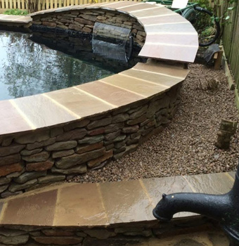 King landscapes photo of round structured raised pond