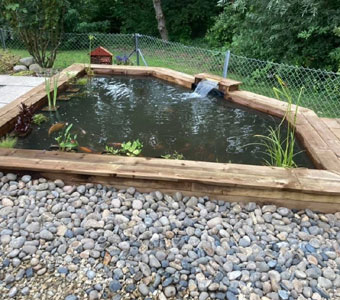King Landscapes photo of timber pond with gravel