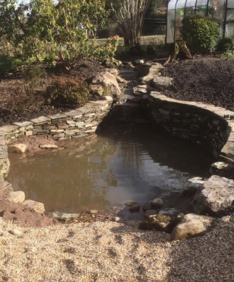 King Landscapes photo of cascading stream into pond