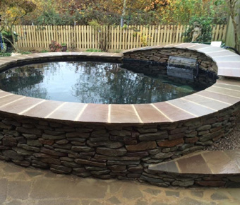 King landscapes photo of round structured pond