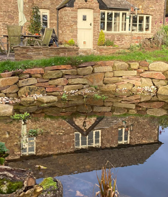 King-landscapes-photo of pond with supporting wall