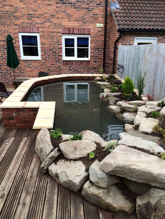 King landscapes photo of pond with decking